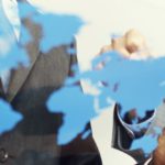 Businessmen World Map Glass Concept