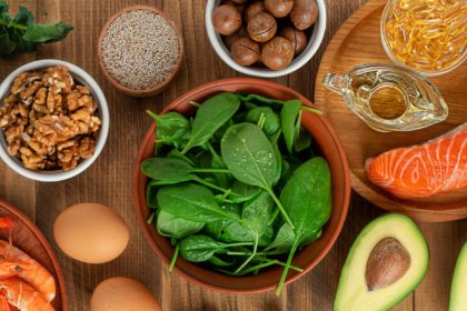 Close up of Omega 3 rich foods on wooden table, directly above.