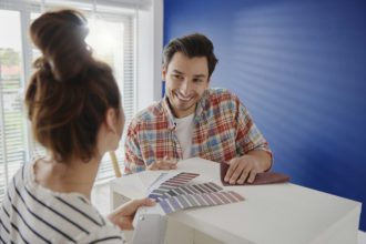 Couple choosing new colors for the furniture