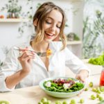 Woman with healthy green food